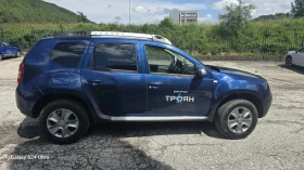 Dacia Duster 1.6i 4x4 - 7650 € / 14962.10 лв. - 44281498 5