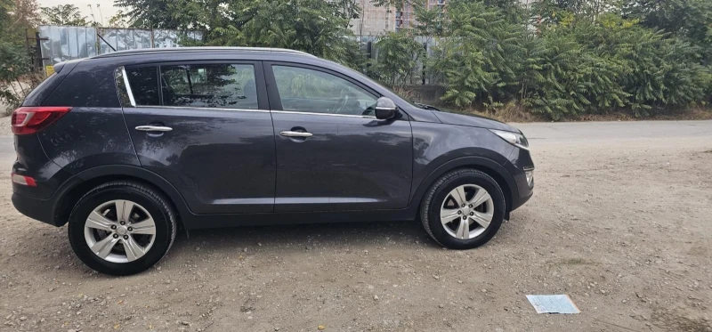 Kia Sportage, снимка 9 - Автомобили и джипове - 48358232