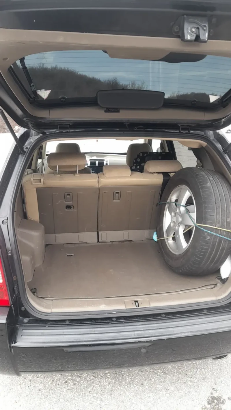 Hyundai Tucson 2.0 Газ/Бензин, снимка 13 - Автомобили и джипове - 52978728