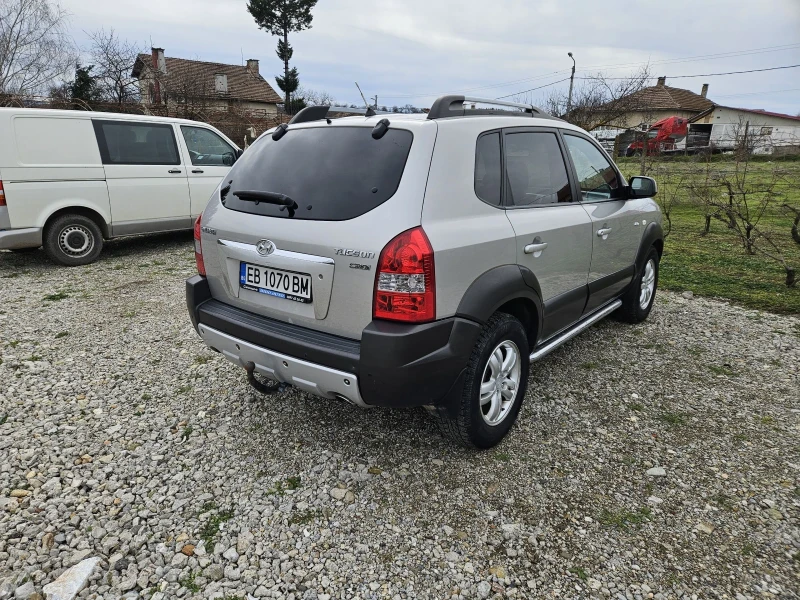 Hyundai Tucson 2.0 crdi, снимка 4 - Автомобили и джипове - 53475803
