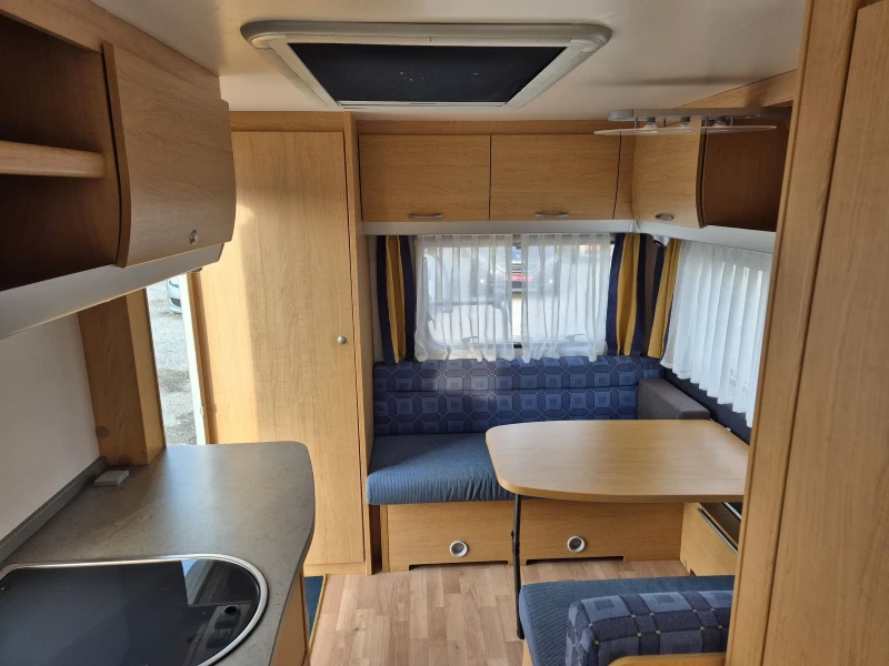 Каравана Knaus 4  МЕСТА WC  БАНЯ ФОРСЕЛТ БОЙЛЕР , снимка 5 - Каравани и кемпери - 52855594