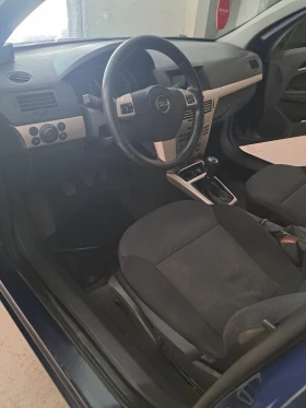 Opel Astra 1, 6..116 к., снимка 11