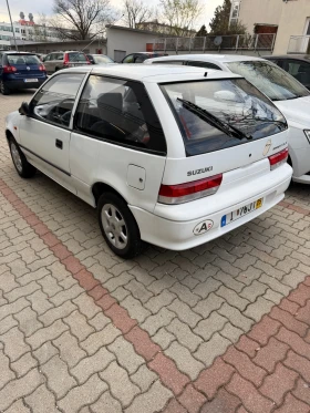 Suzuki Swift 1.0 benzin, снимка 2