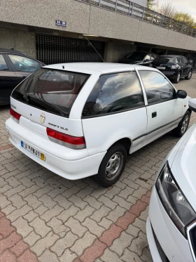 Suzuki Swift 1.0 benzin, снимка 1
