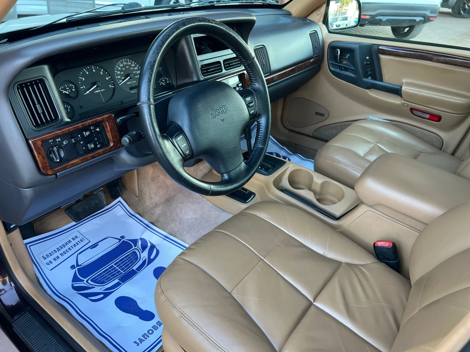 Jeep Grand cherokee 5.2 V8 LIMITED* 4x4* АВТОМАТИК* ШВЕЙЦАРИЯ* КОЖА* , снимка 13 - Автомобили и джипове - 53815725