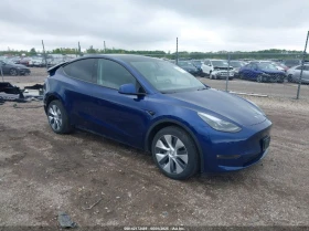     Tesla Model Y U   U All Wheel Drive
