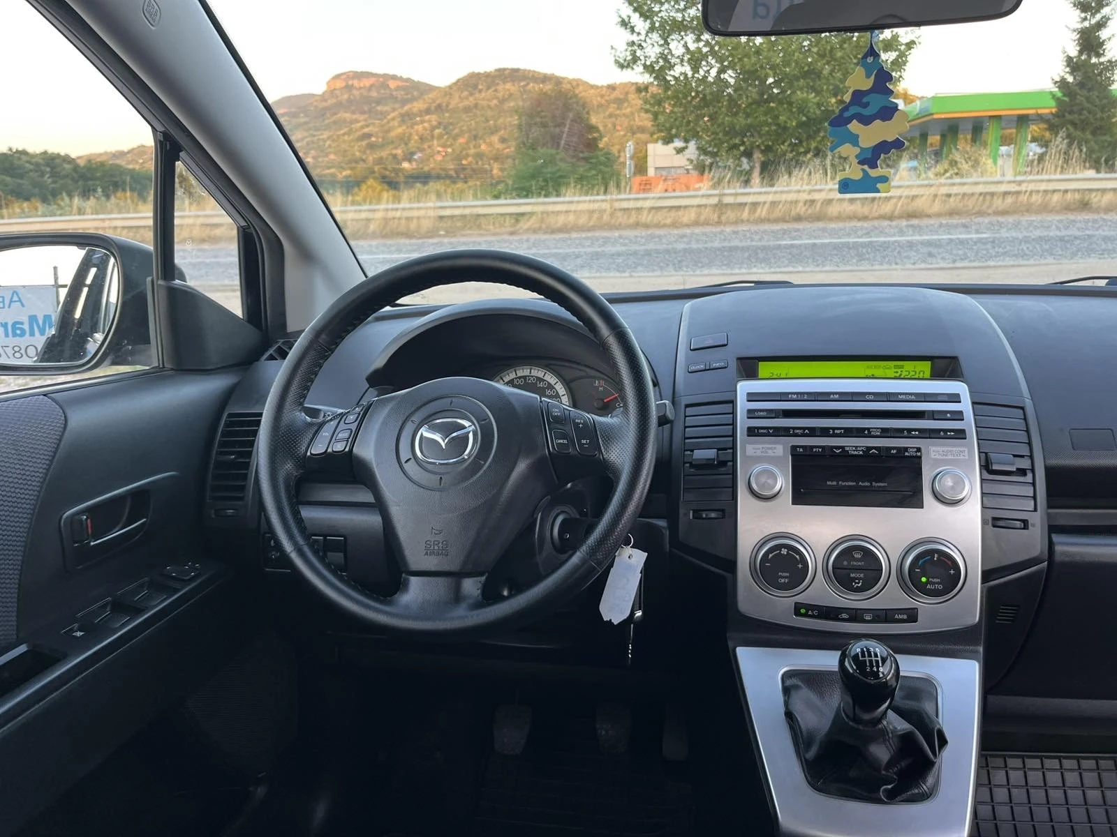 Mazda 5 2.0d 110кс 6 СКОРОСТИ 7 МЕСТА ПЕРФЕКТНА, снимка 11 - Автомобили и джипове - 55513645