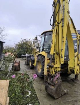 Багер Komatsu WB97R, снимка 3