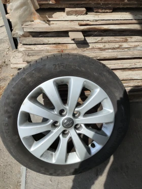        215/55R17  Opel