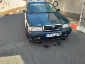 Skoda Octavia 1.6 i, снимка 2