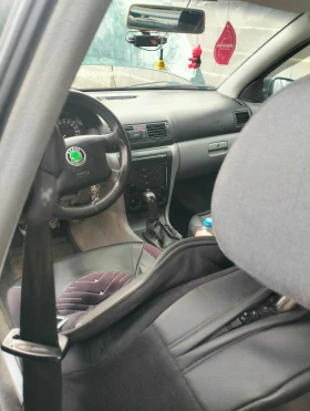 Skoda Octavia 1.6 i, снимка 8