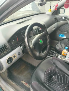 Skoda Octavia 1.6 i, снимка 7