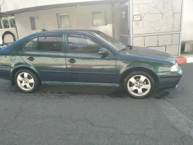 Skoda Octavia 1.6 i, снимка 13