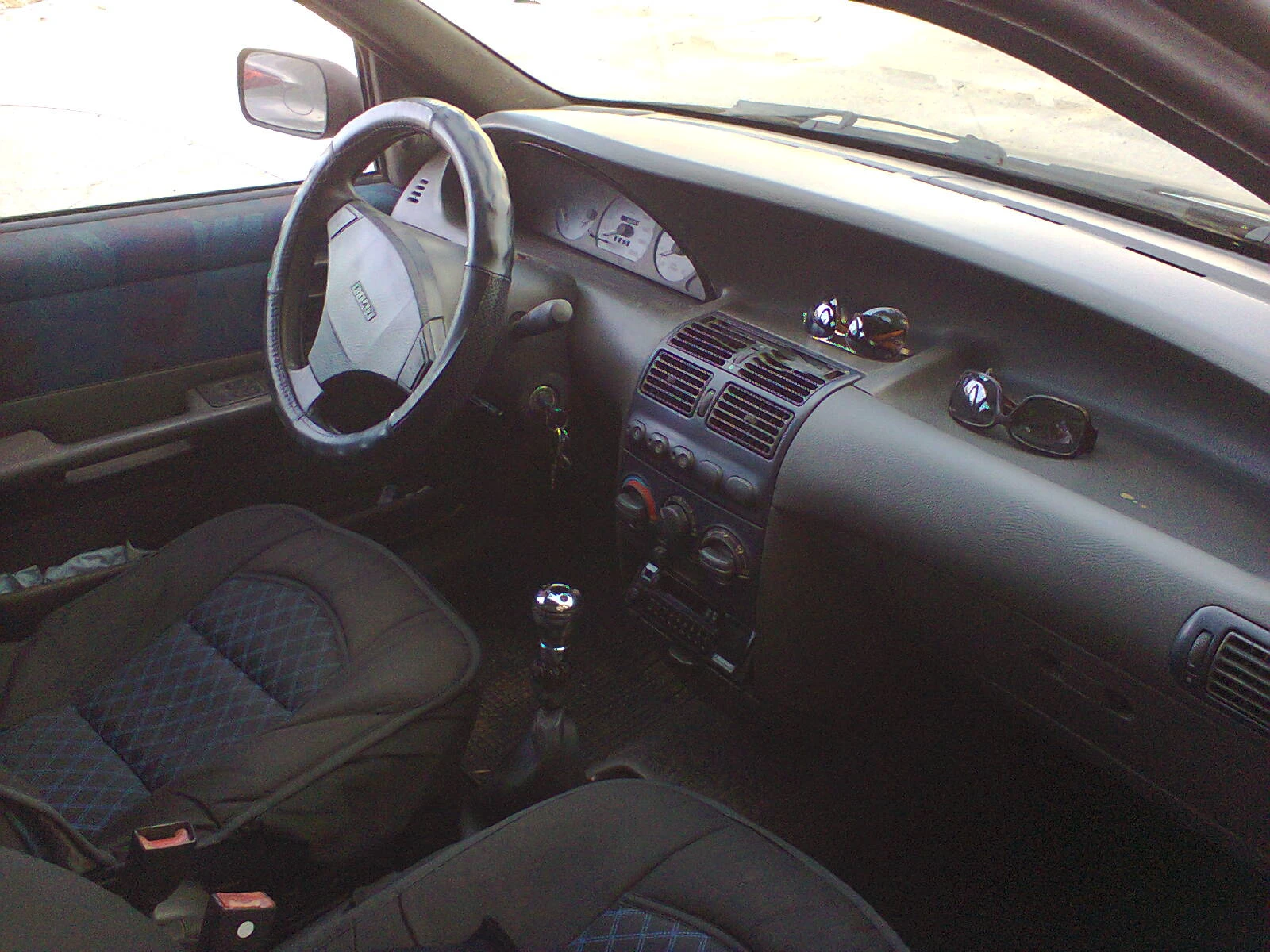 Fiat Punto 1.2 Газ-Бензин Климатик Обслужен 4 врати , снимка 11 - Автомобили и джипове - 55256890