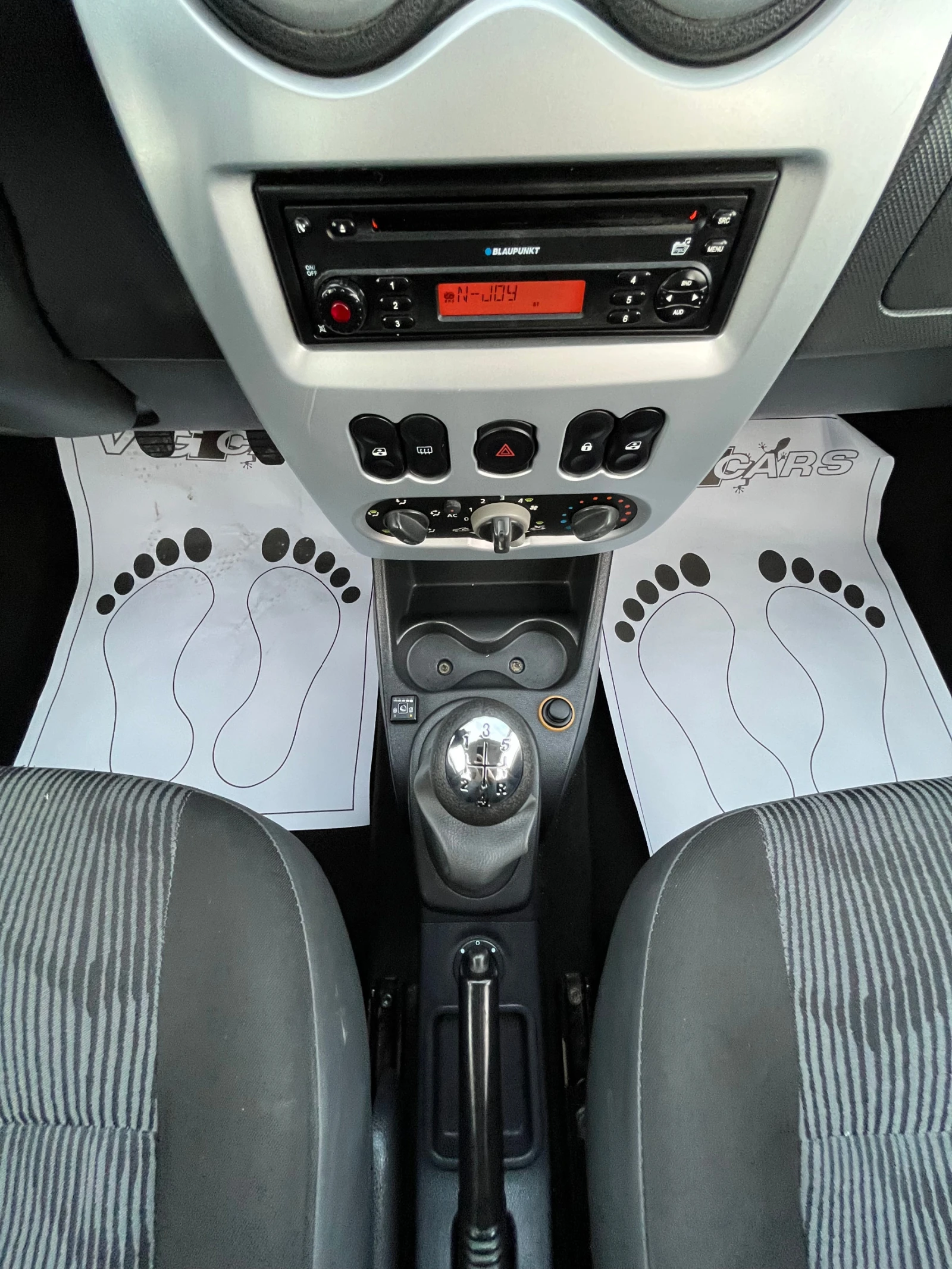 Dacia Sandero 1.4i-75kc-GAZ, ЛИЗИНГ, снимка 11 - Автомобили и джипове - 56225914