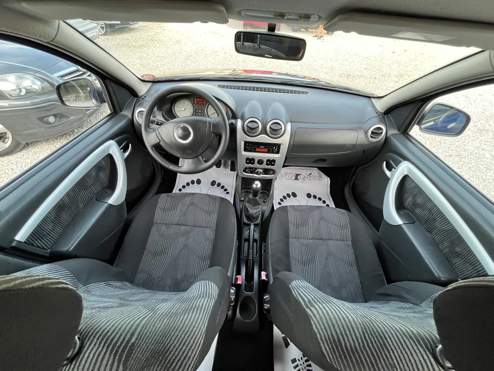 Dacia Sandero 1.4i-75kc-GAZ, ЛИЗИНГ, снимка 9 - Автомобили и джипове - 56225914