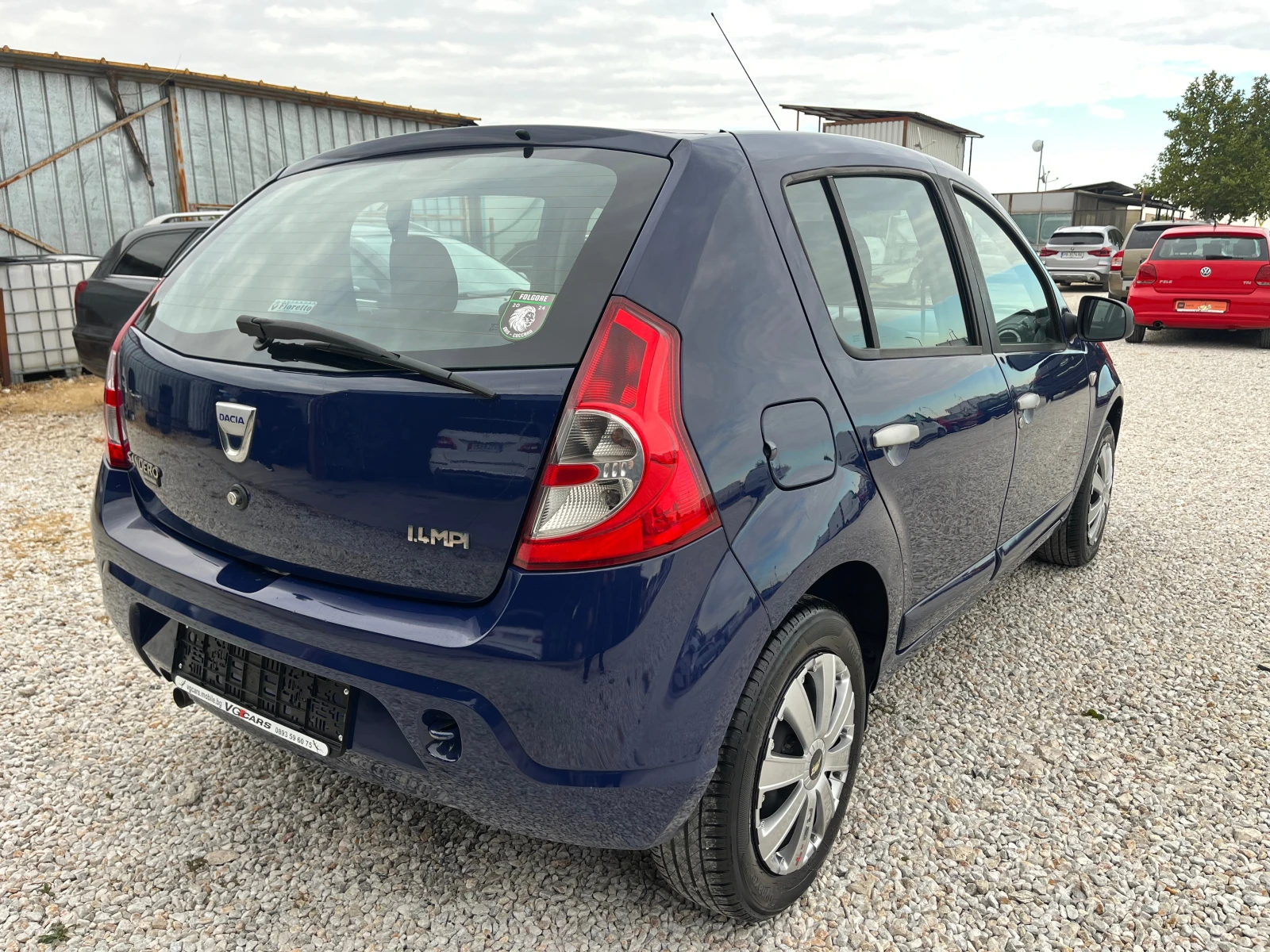 Dacia Sandero 1.4i-75kc-GAZ, ЛИЗИНГ, снимка 7 - Автомобили и джипове - 56225914