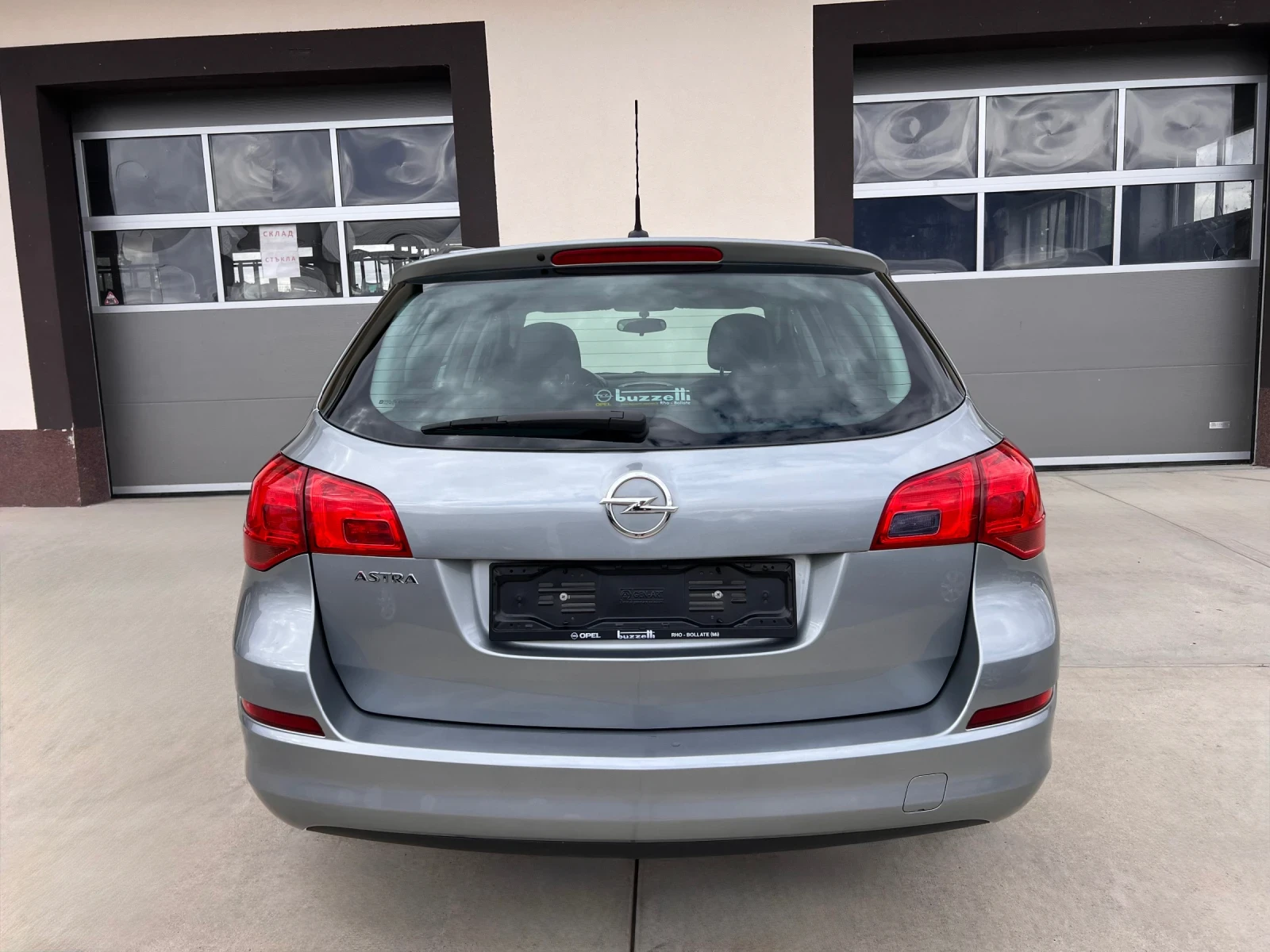 Opel Astra 1.6i 116 к.с. SPORTS TOURER 99000км РЕАЛНИ! EURO5A, снимка 17 - Автомобили и джипове - 56198816