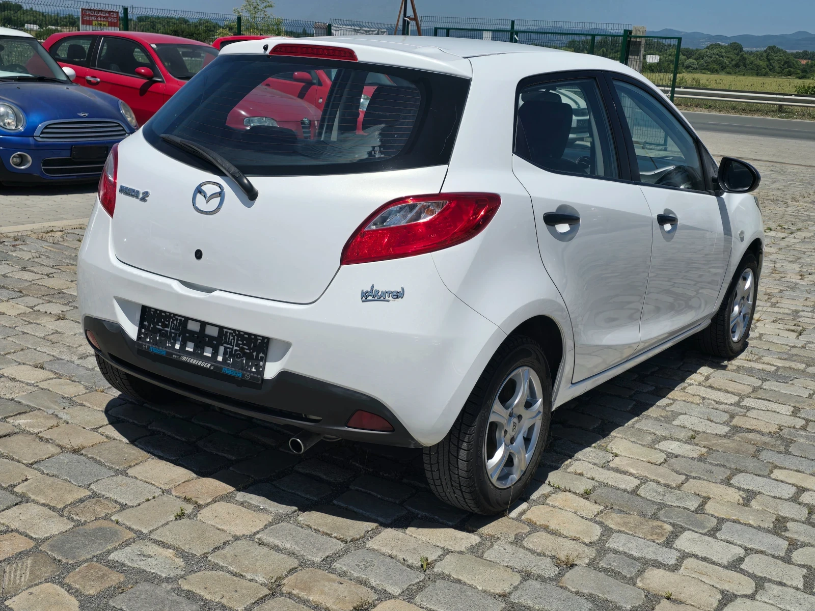 Mazda 2 1.3i 75кс EURO 4 БЯЛА ПЕРЛА - изображение 6