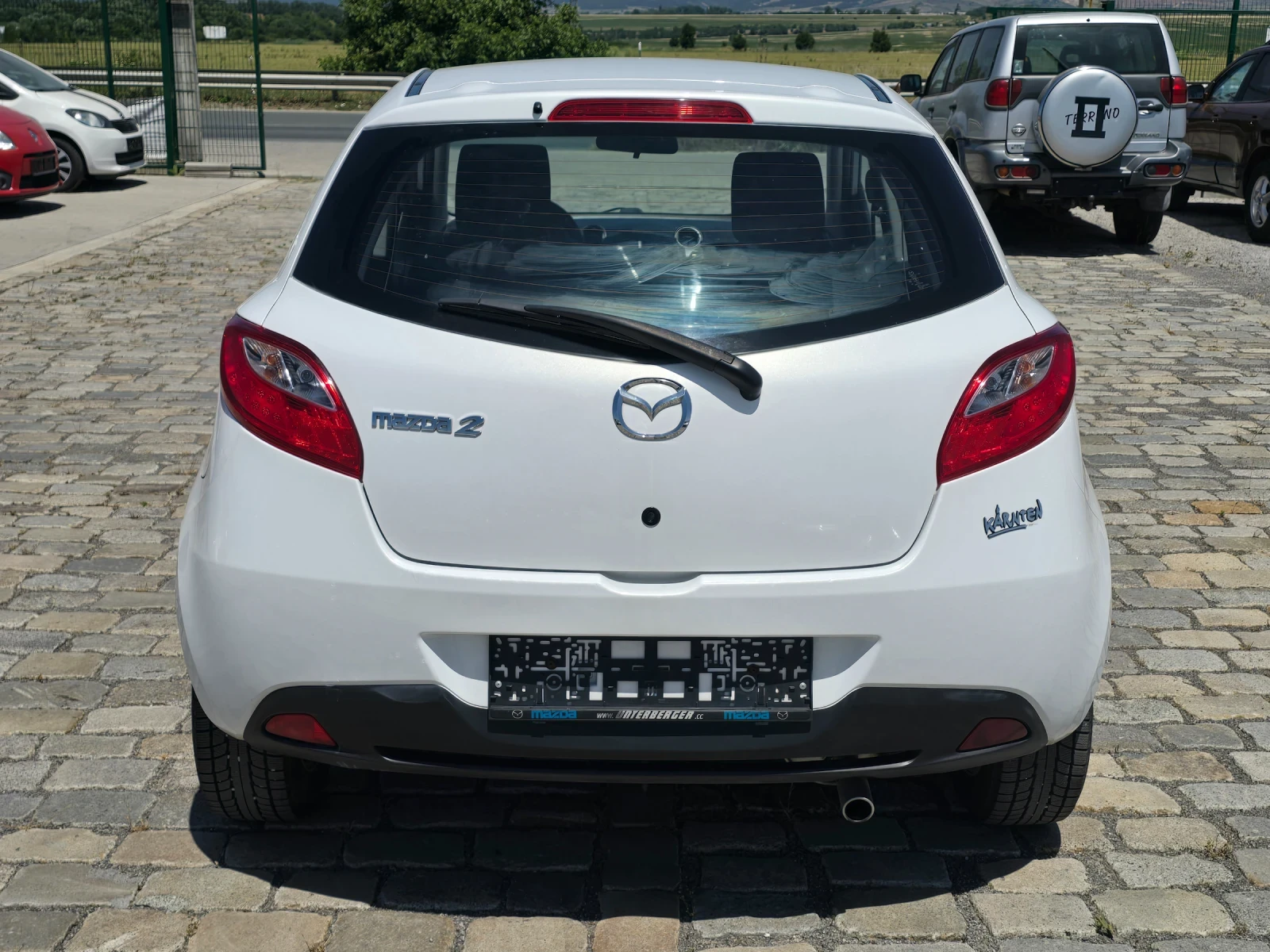 Mazda 2 1.3i 75кс EURO 4 БЯЛА ПЕРЛА - изображение 7
