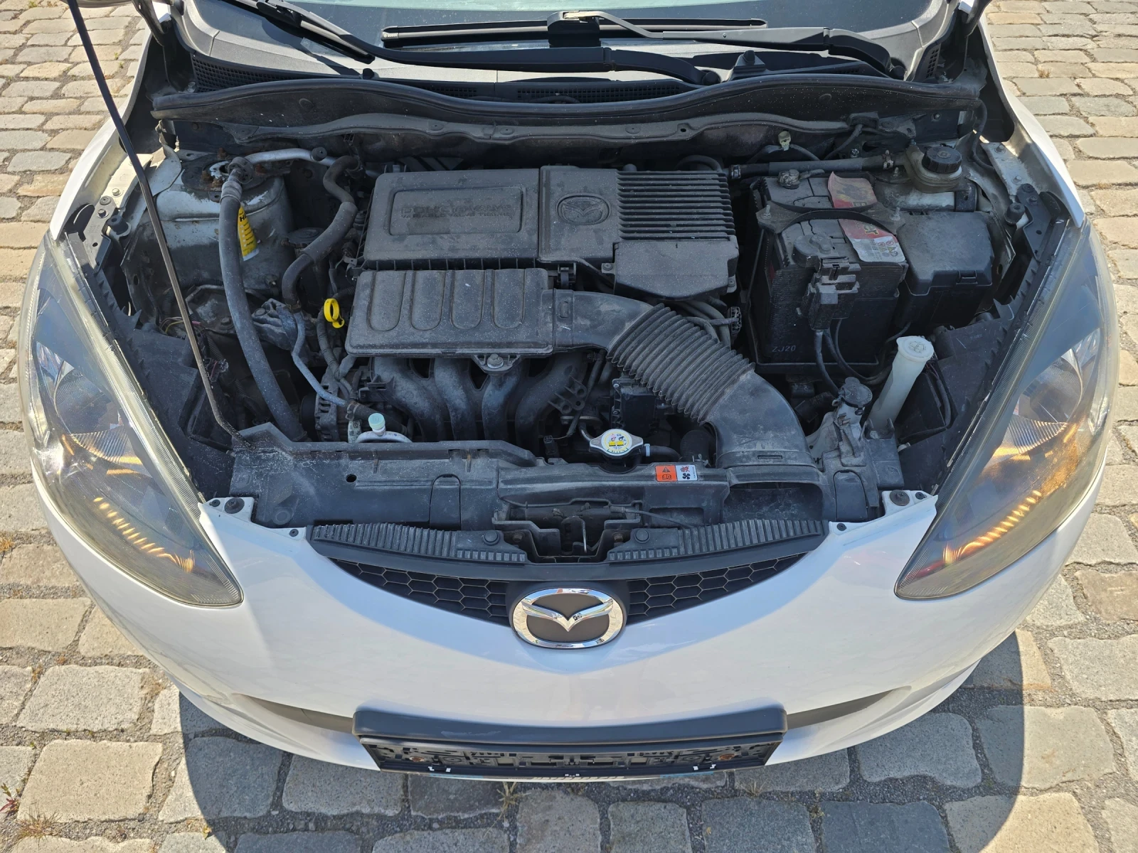 Mazda 2 1.3i 75кс EURO 4 БЯЛА ПЕРЛА - изображение 9