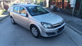 Opel Astra 1.6 перфектен.навигация , снимка 1
