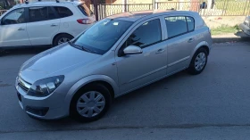 Opel Astra 1.6 перфектен.навигация , снимка 6
