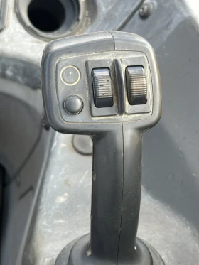 Телескопични товарачи Caterpillar CAT TH 414, снимка 15