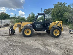 Телескопични товарачи Caterpillar CAT TH 414, снимка 3