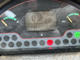 Телескопични товарачи Caterpillar CAT TH 414, снимка 16