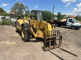 Телескопични товарачи Caterpillar CAT TH 414, снимка 1
