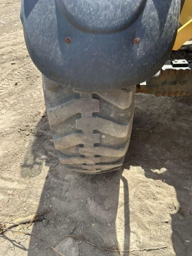 Телескопични товарачи Caterpillar CAT TH 414, снимка 11