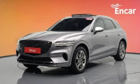 Genesis GV70 2.5T AWD* DISTRONIC* ПОДГРЕВ* ОБДУХВАНЕ* PANORAMA*, снимка 1