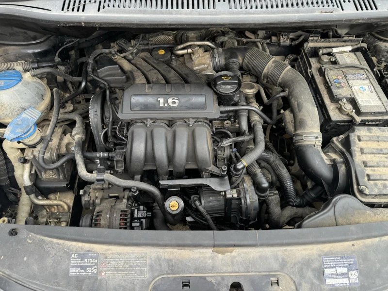 VW Touran 1.6, снимка 6 - Автомобили и джипове - 47199296