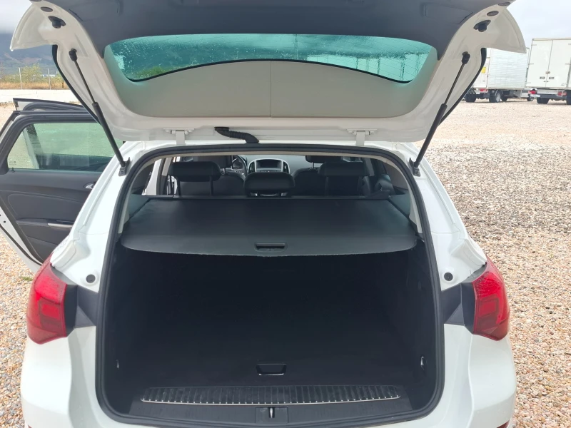 Opel Astra 1.7CDTI/Euro5A, снимка 11 - Автомобили и джипове - 51934437