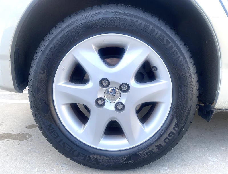 Toyota Corolla 1.6 MT, снимка 17 - Автомобили и джипове - 50372416