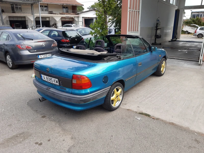 Opel Astra, снимка 7 - Автомобили и джипове - 51789470