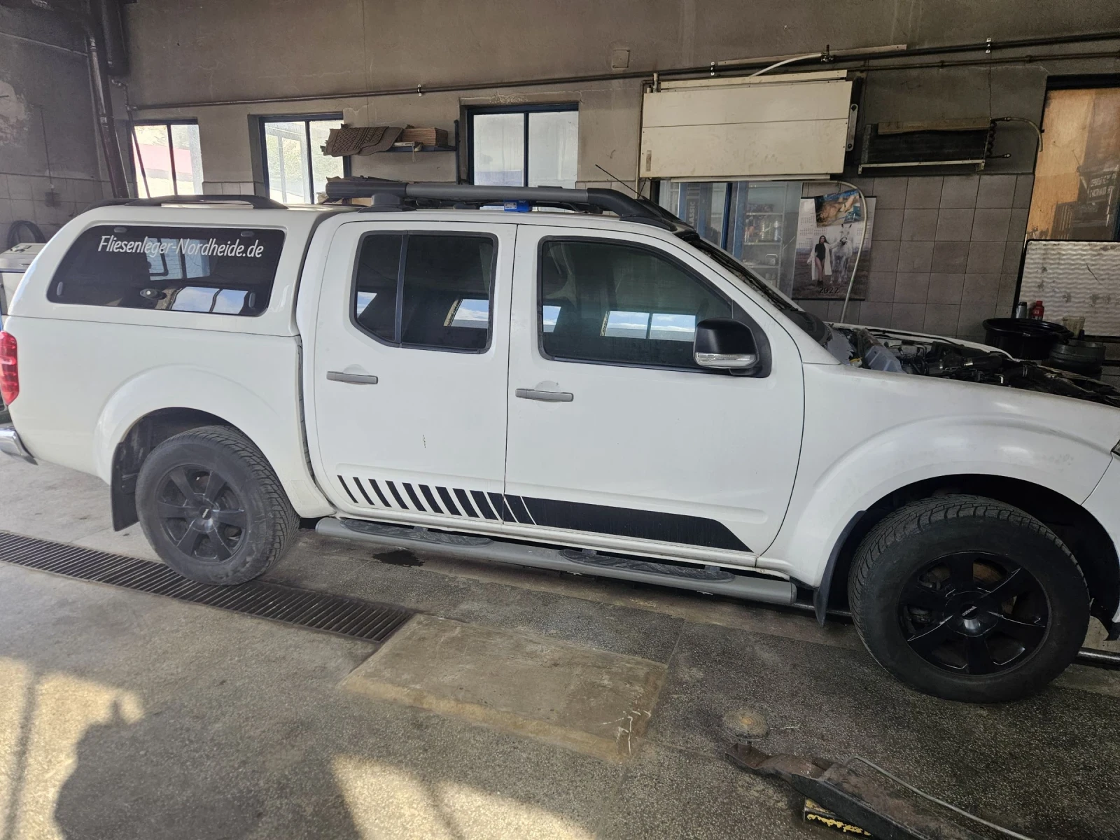Nissan Navara 2.5D, снимка 11 - Автомобили и джипове - 54229535