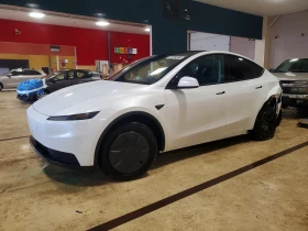 ������ Tesla Model Y