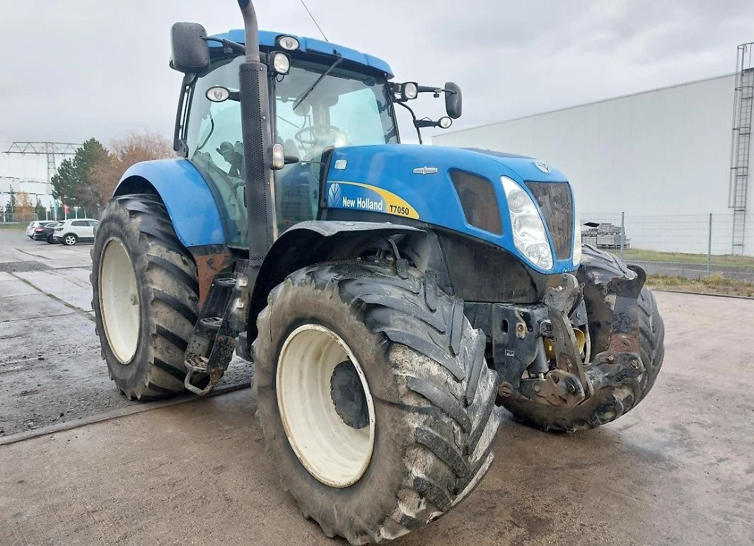 Трактор New Holland Т 70 50 - изображение 2