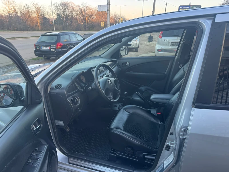 Mitsubishi Outlander 2.0 I Turbo Швейцария, снимка 12 - Автомобили и джипове - 52775594