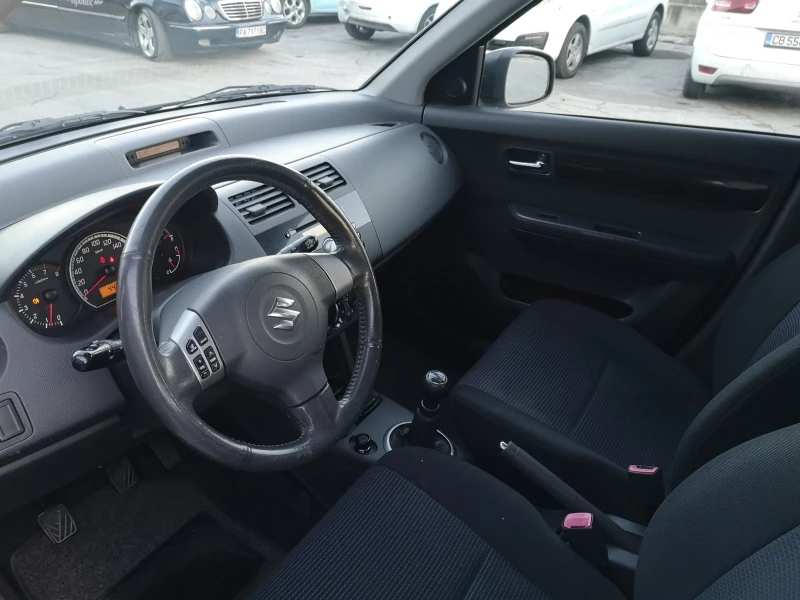 Suzuki Swift 1.3 4X4 44000 KM, снимка 9 - Автомобили и джипове - 48524025