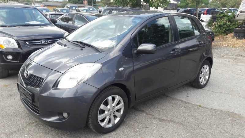 Toyota Yaris  1.3 VVT-i Cool, снимка 11 - Автомобили и джипове - 47073408