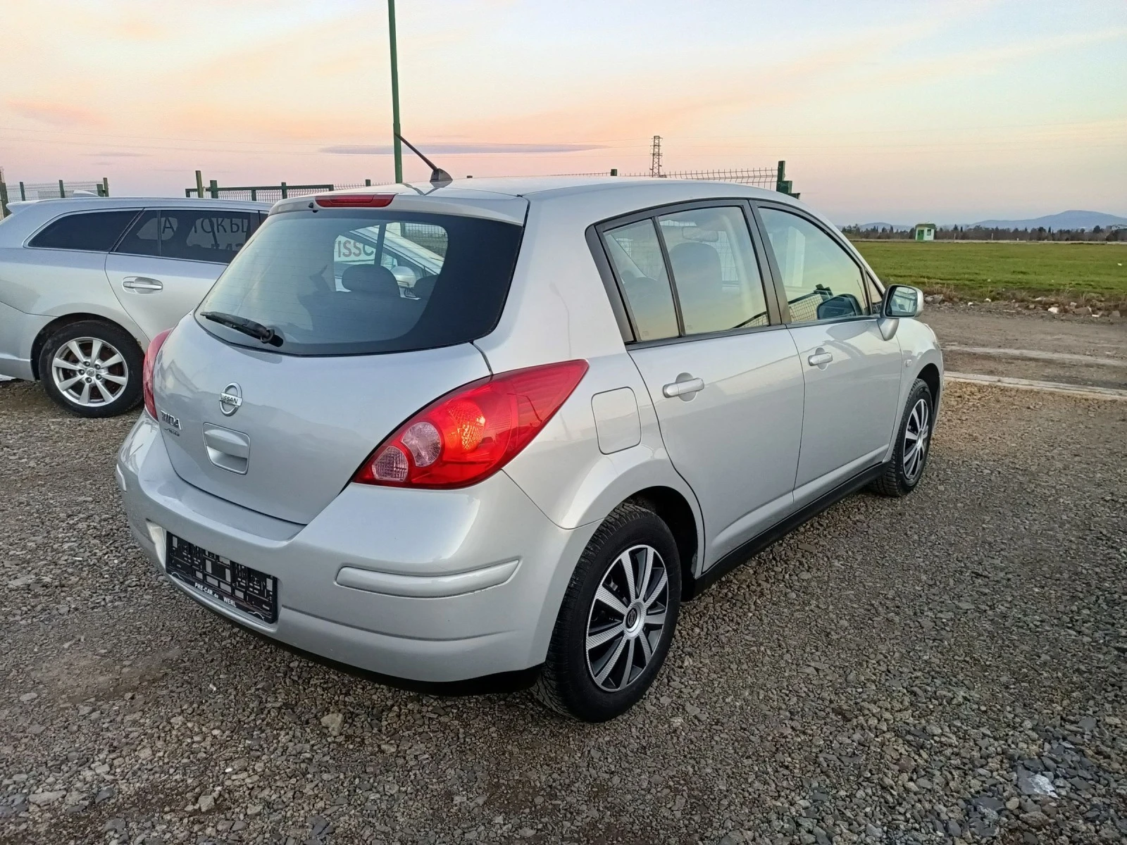 Nissan Tiida 1.5dCi - изображение 7