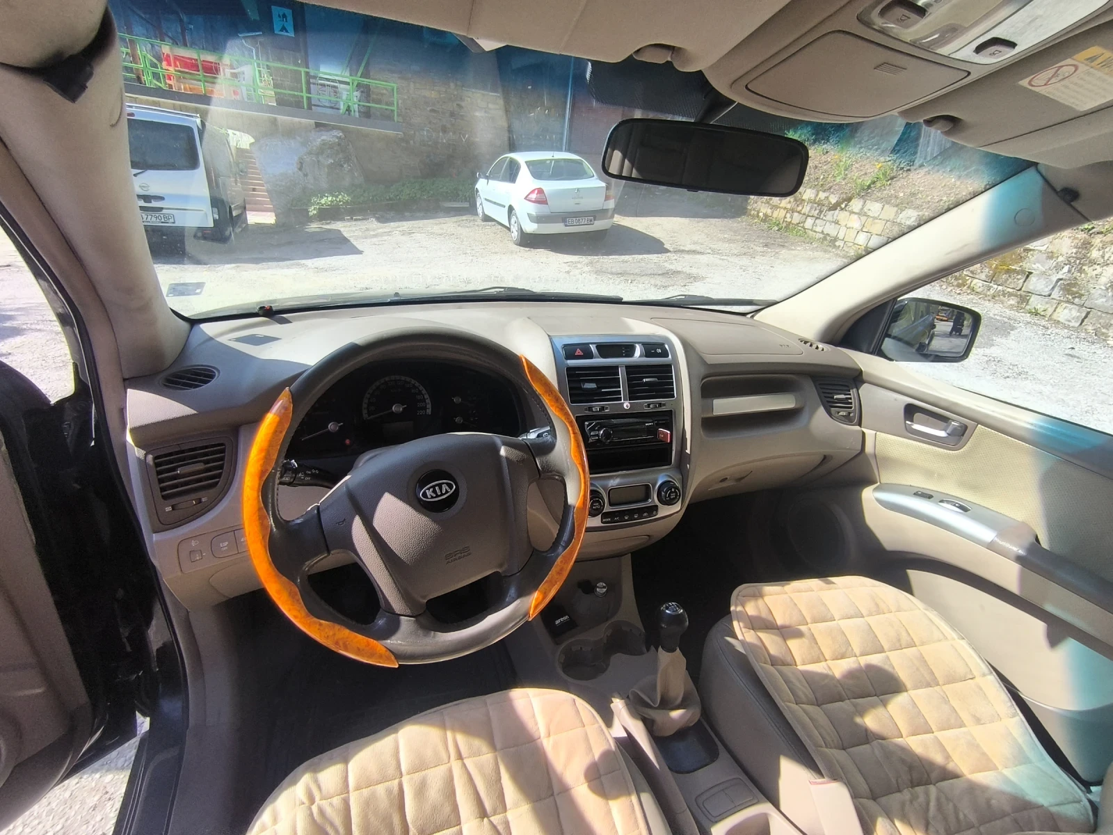 Kia Sportage 2.0, снимка 13 - Автомобили и джипове - 54776079