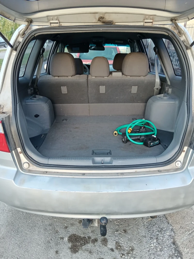 Kia Carens 2.0 CRDI, снимка 16 - Автомобили и джипове - 51603735