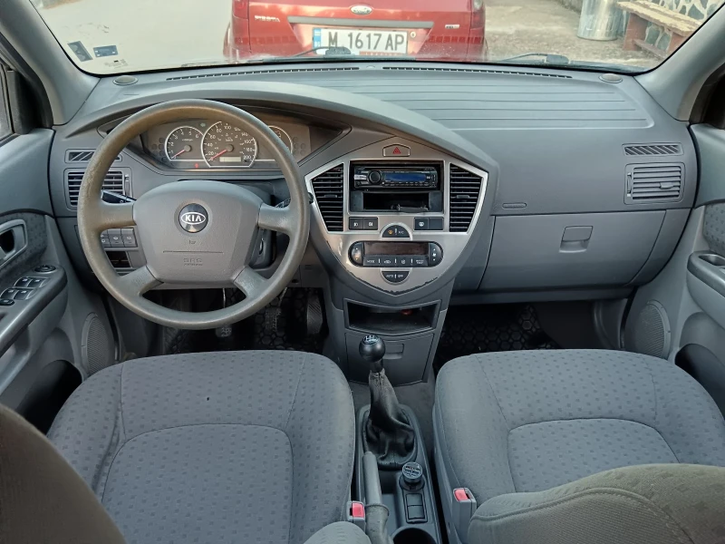 Kia Carens 2.0 CRDI, снимка 10 - Автомобили и джипове - 51603735
