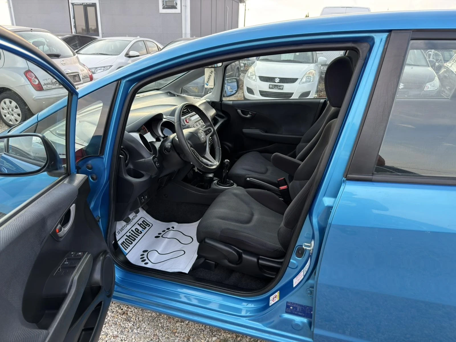 Honda Jazz 1.4i Swiss, снимка 9 - Автомобили и джипове - 55149015
