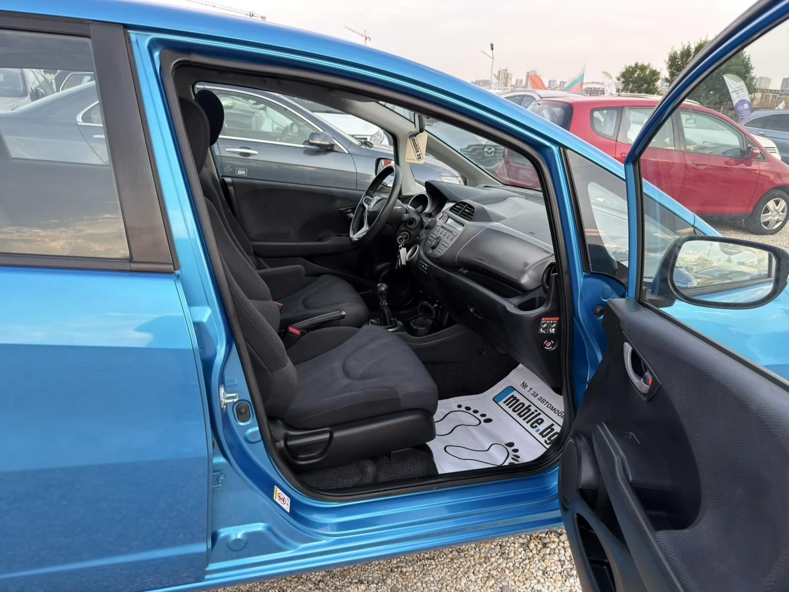 Honda Jazz 1.4i Swiss, снимка 13 - Автомобили и джипове - 55149015