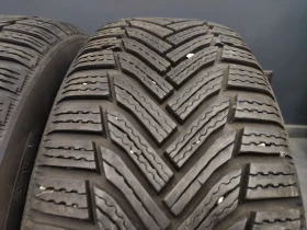 Гуми Зимни 215/65R16, снимка 1 - Гуми и джанти - 44465737